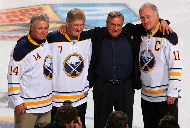 BUFFALO, NY - FEBRUARY 23:  New Buffalo Sabres owner Terry Pegula stands with former Sabres palyers Rene Robert #14, Rick Martin #7 and Gilbert Perrault #11  during pre game ceremonies prior to play against the Atlanta Thrashers at HSBC Arena on February 23, 2011 in Buffalo, New York.  (Photo by Rick Stewart/Getty Images)