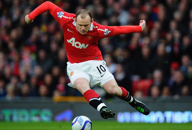 MANCHESTER, ENGLAND - MARCH 12:  Wayne Rooney of Manchester United controls the ball during the FA Cup sponsored by E.On Sixth Round match between Manchester United and Arsenal at Old Trafford on March 12, 2011 in Manchester, England.  (Photo by Clive Mason/Getty Images)