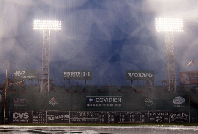 BOSTON - AUGUST 24:  The game between the Seattle Mariners and the Boston Red Sox is postponed due to rain on August 24, 2010 at Fenway Park in Boston, Massachusetts. The teams will play a double header tomorrow.  (Photo by Elsa/Getty Images)
