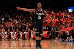 NEW YORK, NY - MARCH 11: Kemba Walker #15 of the Connecticut Huskies gestures after a play against the Syracuse Orange during the semifinals of the 2011 Big East Men's Basketball Tournament presented by American Eagle Outfitters at Madison Square Garden on March 11, 2011 in New York City.  (Photo by Chris Trotman/Getty Images)