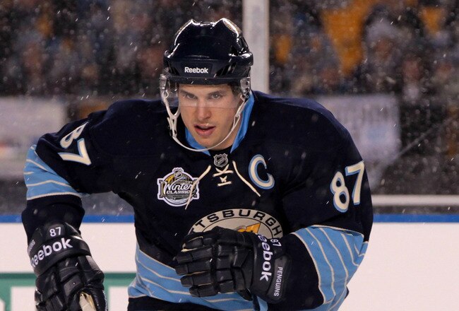 PITTSBURGH, PA - JANUARY 01:  Sidney Crosby #87 of the Pittsburgh Penguins skates against the Washington Capitals during the 2011 NHL Bridgestone Winter Classic at Heinz Field on January 1, 2011 in Pittsburgh, Pennsylvania. Washington won 3-1.  (Photo by Jamie Squire/Getty Images)