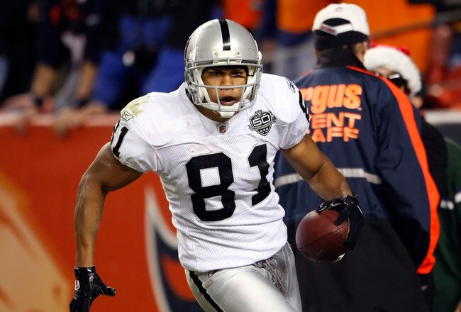 DENVER - DECEMBER 20:  Chaz Schilens #81 of the Oakland Raiders celebrates after scoring a touchdown late in the fourth quarter against the Denver Broncos at Invesco Field at Mile High on December 20, 2009 in Denver, Colorado. The Raiders defeated the Broncos 20-19.  (Photo by Jeff Gross/Getty Images)