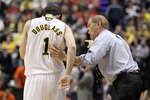 INDIANAPOLIS, IN - MARCH 11:  Head coach John Beilein of the Michigan Wolverines talks to Stu Douglass #1 against the Illinois Fighting Illini during the quarterfinals of the 2011 Big Ten Men's Basketball Tournament at Conseco Fieldhouse on March 11, 2011 in Indianapolis, Indiana.  (Photo by Andy Lyons/Getty Images)