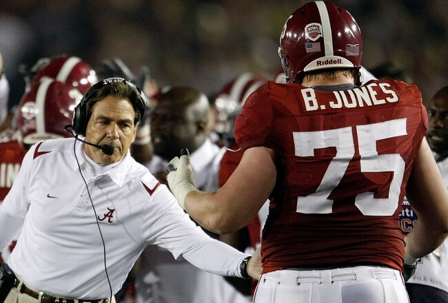 PASADENA, CA - JANUARY 07:  Head coach Nick Saban of the Alabama Crimson Tide congratulates lineman Barrett Jones #75 after a touchdown against the Texas Longhorns in the second quarter of the Citi BCS National Championship game at the Rose Bowl on January 7, 2010 in Pasadena, California.  (Photo by Jeff Gross/Getty Images)