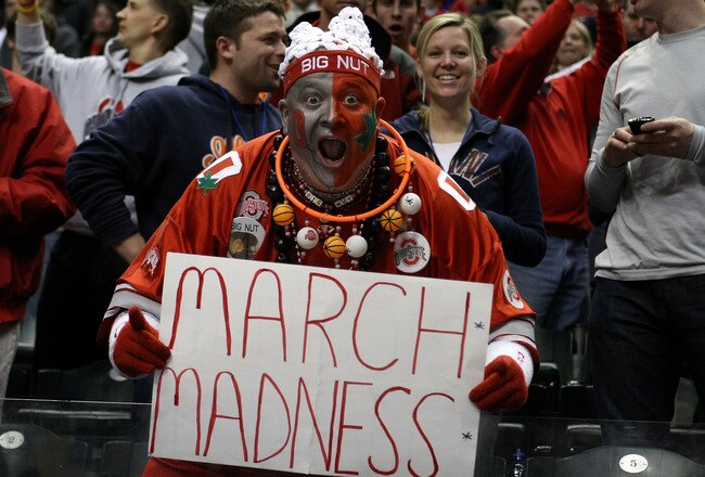 INDIANAPOLIS, IN - MARCH 13:  John 'Big Nut' Peters, fan of the Ohio State Buckeyes holds up a sign which reads 'March Madness' after they won 71-60 against the Penn State Nittany Lions during the championship game of the 2011 Big Ten Men's Basketball Tournament at Conseco Fieldhouse on March 13, 2011 in Indianapolis, Indiana.  (Photo by Chris Chambers/Getty Images)