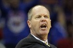 KANSAS CITY, MO - MARCH 11:  Head coach Tad Boyle of the Colorado Buffaloes reacts to a play against the Kansas Jayhawks during their semifinal game in the 2011 Phillips 66 Big 12 Men's Basketball Tournament at Sprint Center on March 11, 2011 in Kansas City, Missouri.  (Photo by Jamie Squire/Getty Images)