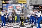 BRISTOL, TN - MARCH 21:  Jimmie Johnson (R), driver of the #48 Lowe's Chevrolet, celebrates with crew chief Chad Knaus (L) in Victory Lane after winning the NASCAR Sprint Cup Series Food City 500 at Bristol Motor Speedway on March 21, 2010 in Bristol, Tennessee.  (Photo by Geoff Burke/Getty Images for NASCAR)
