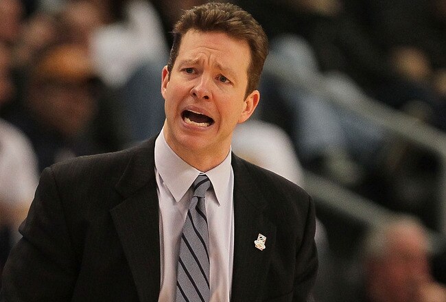 PROVIDENCE, RI - MARCH 18:  Coach Chris Mooney of the Richmond Spiders reacts to an official's call against the Saint Mary's Gaels during the first round of the 2010 NCAA men's basketball tournament at Dunkin' Donuts Center on March 18, 2010 in Providence, Rhode Island. (Jim Rogash/Getty Images)