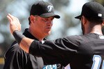 DUNEDIN, FL - FEBRUARY 26:  Manager John Farrell #52 talks with catcher J. P. Arencibia #9 of the Toronto Blue Jays before play against the Detroit Tigers February 26, 2011 at Florida Auto Exchange Stadium in Dunedin, Florida.  (Photo by Al Messerschmidt/Getty Images)