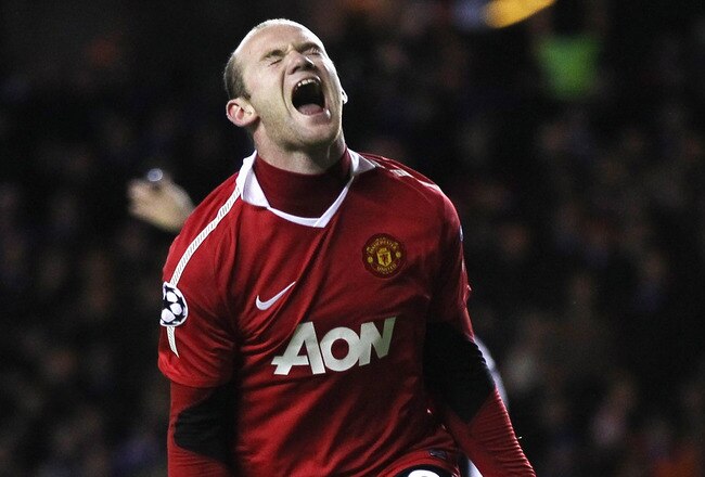 GLASGOW, SCOTLAND - NOVEMBER 24:  Wayne Rooney of Manchester United celebrates after scoring the winning goal from the penalty spot during the UEFA Champions League Group C match between Glasgow Rangers and Manchester United at Ibrox on November 24, 2010 in Glasgow, Scotland.  (Photo by Alex Livesey/Getty Images)