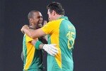 NAGPUR, INDIA - MARCH 12:  Robin Peterson and Graeme Smith of South Africa celebrate the teams' win during the ICC Cricket World Cup match between South Africa and India at VCA Stadium on March 12, 2011 in Nagpur, India. (Photo by Lee Warren / Gallo Images/Getty Images)