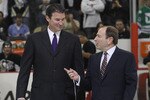 PITTSBURGH - OCTOBER 07:  Team owner Mario Lemieux of the Pittsburgh Penguins and NHL commissioner Gary Bettman arrive for the opening faceoff between the Penguins and the Philadelphia Flyers at the Consol Energy Center on October 7, 2010 in Pittsburgh, Pennsylvania. (Photo by Bruce Bennett/Getty Images)