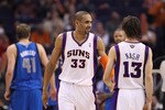 PHOENIX, AZ - FEBRUARY 17:  Grant Hill #33 and Steve Nash #13 of the Phoenix Suns during the NBA game against the Dallas Mavericks at US Airways Center on February 17, 2011 in Phoenix, Arizona.  The Mavericks defeated the Suns 112-106.  NOTE TO USER: User expressly acknowledges and agrees that, by downloading and or using this photograph, User is consenting to the terms and conditions of the Getty Images License Agreement.  (Photo by Christian Petersen/Getty Images)