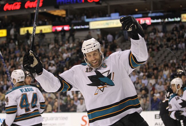 DALLAS, TX - MARCH 15:  Center Joe Thornton #19 of the San Jose Sharks celebrates a goal against the Dallas Stars at American Airlines Center on March 15, 2011 in Dallas, Texas.  (Photo by Ronald Martinez/Getty Images)