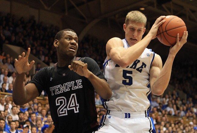 DURHAM, NC - FEBRUARY 23: Lavoy Allen #24 of the Temple Owls battles for a loose ball with Mason Plumlee #5 of the Duke Blue Devils during their game at Cameron Indoor Stadium on February 23, 2011 in Durham, North Carolina.  (Photo by Streeter Lecka/Getty Images)