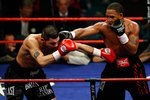 LAS VEGAS - NOVEMBER 22:  (R-L) James Kirkland connects with a right to the face of Brian Vera during their middleweight fight at the MGM Grand Garden Arena November 22, 2008 in Las Vegas, Nevada.  (Photo by Ethan Miller/Getty Images)