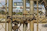 MIAMI GARDENS, FL - MARCH 03:  A view of Sun Life Stadium behind a locked gate as the NFL lockout looms on March 3, 2011 in Miami Gardens, Florida.  (Photo by Mike Ehrmann/Getty Images)