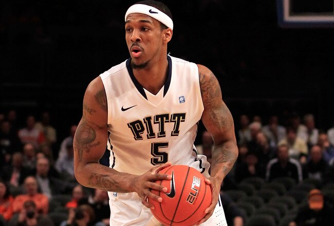 NEW YORK, NY - MARCH 10: Gilbert Brown #5 of the Pittsburgh Panthers brings the ball up court against the Connecticut Huskies during the quarterfinals of the 2011 Big East Men's Basketball Tournament presented by American Eagle Outfitters  at Madison Square Garden on March 10, 2011 in New York City.  (Photo by Chris Trotman/Getty Images)