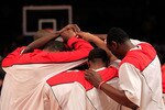NEW YORK, NY - MARCH 10: The St. John's Red Storm huddles before their game against the Syracuse Orange during the quarterfinals of the 2011 Big East Men's Basketball Tournament presented by American Eagle Outfitters  at Madison Square Garden on March 10, 2011 in New York City.  (Photo by Chris Trotman/Getty Images)
