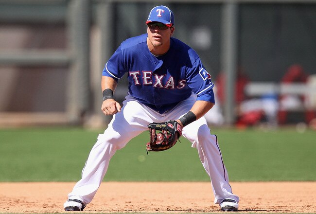 SURPRISE, AZ - MARCH 11:  Infielder Chris Davis #19 of the Texas Rangers during the spring training game against the Cincinnati Reds at Surprise Stadium on March 11, 2011 in Surprise, Arizona.  (Photo by Christian Petersen/Getty Images)