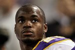 MINNEAPOLIS - OCTOBER 17:  Running back Adrian Peterson #28 of the Minnesota Vikings looks on during the game against the Dallas Cowboys at Mall of America Field on October 17, 2010 in Minneapolis, Minnesota.  The Vikings defeated the Cowboys 24-21.  (Photo by Jeff Gross/Getty Images)
