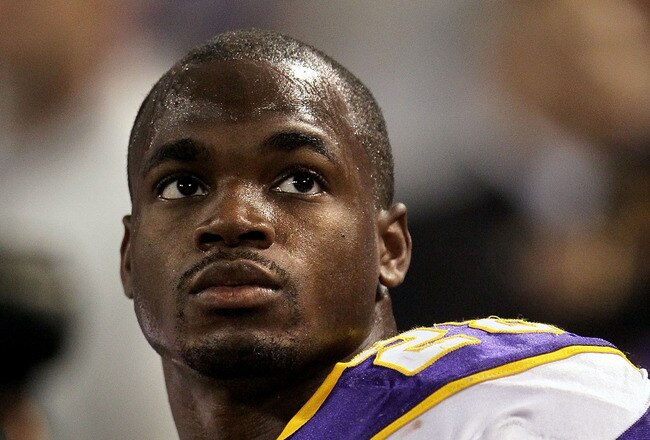 MINNEAPOLIS - OCTOBER 17:  Running back Adrian Peterson #28 of the Minnesota Vikings looks on during the game against the Dallas Cowboys at Mall of America Field on October 17, 2010 in Minneapolis, Minnesota.  The Vikings defeated the Cowboys 24-21.  (Photo by Jeff Gross/Getty Images)