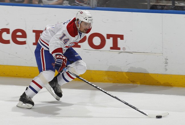 SUNRISE, FL - MARCH 3: Tomas Plekanec #14 of the Montreal Canadiens skates with the puck against the Florida Panthers on March 3, 2011 at the BankAtlantic Center in Sunrise, Florida. The Canadiens defeated the Panthers 4-0. (Photo by Joel Auerbach/Getty Images)