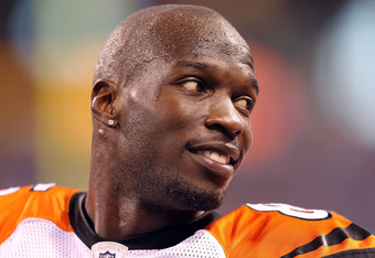 INDIANAPOLIS - SEPTEMBER 02:  Chad Ochocinco #85  of the Cincinnati Bengals talks with teammates during the NFL preseason game against the Indianapolis Colts at Lucas Oil Stadium on September 2, 2010 in Indianapolis, Indiana.  (Photo by Andy Lyons/Getty Images)