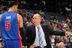 ATLANTA - NOVEMBER 03:  Head coach John Kuester and Austin Daye #5 of the Detroit Pistons against the Atlanta Hawks at Philips Arena on November 3, 2010 in Atlanta, Georgia.  NOTE TO USER: User expressly acknowledges and agrees that, by downloading and/or using this Photograph, User is consenting to the terms and conditions of the Getty Images License Agreement.  (Photo by Kevin C. Cox/Getty Images)