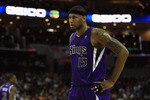 CHARLOTTE, NC - FEBRUARY 25:  DeMarcus Cousins #15 of the Sacramento Kings reacts to a call against the Charlotte Bobcats during their game at Time Warner Cable Arena on February 25, 2011 in Charlotte, North Carolina. NOTE TO USER: User expressly acknowledges and agrees that, by downloading and/or using this Photograph, User is consenting to the terms and conditions of the Getty Images License Agreement.  (Photo by Streeter Lecka/Getty Images)
