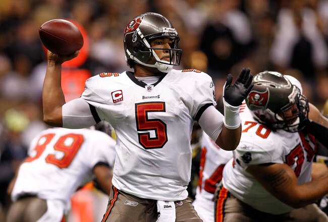 NEW ORLEANS, LA - JANUARY 02:  Quarterback Josh Freeman #5  of the Tampa Bay Buccaneers throws the ball during the game against the New Orleans Saints at the Louisiana Superdome on January 2, 2011 in New Orleans, Louisiana.  (Photo by Chris Graythen/Getty Images)