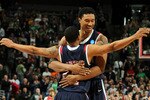 DENVER, CO - MARCH 17:  Kevin Anderson #14 and Justin Harper #32 of the Richmond Spiders celebrate after defeating the Vanderbilt Commodores during the second round of the 2011 NCAA men's basketball tournament at Pepsi Center on March 17, 2011 in Denver, Colorado. Richmond won the game by a score of 69-66.  (Photo by Doug Pensinger/Getty Images)