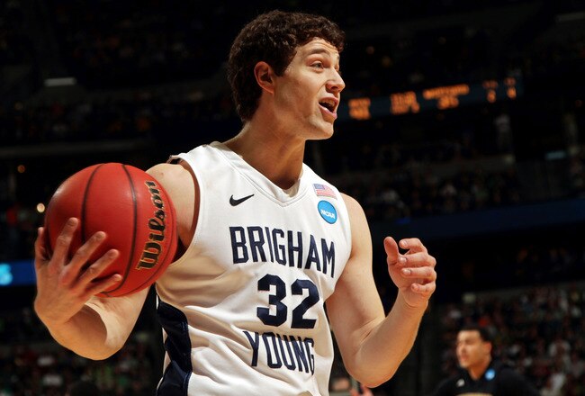 DENVER, CO - MARCH 17:  Jimmer Fredette #32 of the Brigham Young Cougars reacts to a call while playing against the Wofford Terriers during the second round of the 2011 NCAA men's basketball tournament at Pepsi Center on March 17, 2011 in Denver, Colorado.  (Photo by Doug Pensinger/Getty Images)