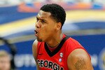 ATLANTA, GA - MARCH 11:  Trey Thompkins #33 of the Georgia Bulldogs celebrates after hitting a 3 point shot against the Alabama Crimson Tide during the quarterfinals of the SEC Men's Basketball Tournament at Georgia Dome on March 11, 2011 in Atlanta, Georgia.  (Photo by Kevin C. Cox/Getty Images)