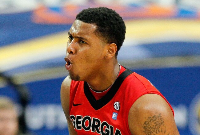 ATLANTA, GA - MARCH 11:  Trey Thompkins #33 of the Georgia Bulldogs celebrates after hitting a 3 point shot against the Alabama Crimson Tide during the quarterfinals of the SEC Men's Basketball Tournament at Georgia Dome on March 11, 2011 in Atlanta, Georgia.  (Photo by Kevin C. Cox/Getty Images)