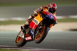 DOHA, QATAR - MARCH 17:  Casey Stoner of Australia and Repsol Honda Team lifts the front wheel during the free practice of Doha GP at Losail Circuit on March 17, 2011 in Doha, Qatar.  (Photo by Mirco Lazzari gp/Getty Images)