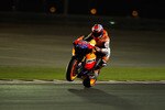 DOHA, QATAR - MARCH 17:  Casey Stoner of Australia and Repsol Honda Team  lifts the front wheel during the free practice of Doha GP at Losail Circuit on March 17, 2011 in Doha, Qatar.  (Photo by Mirco Lazzari gp/Getty Images)