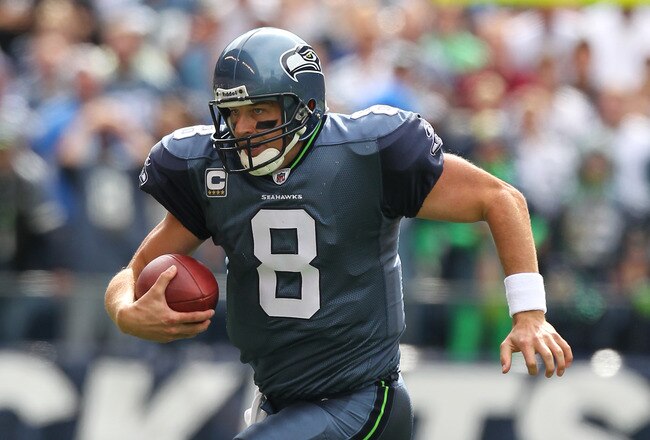SEATTLE - SEPTEMBER 12:  Quarterback Matt Hasselbeck #8 of the Seattle Seahawks scrambles during the NFL season opener against the San Francisco 49ers at Qwest Field on September 12, 2010 in Seattle, Washington. (Photo by Otto Greule Jr/Getty Images)