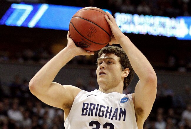 DENVER, CO - MARCH 19:  Jimmer Fredette #32 of the Brigham Young Cougars shoot against the Gonzaga Bulldogs during the third round of the 2011 NCAA men's basketball tournament at Pepsi Center on March 19, 2011 in Denver, Colorado.  (Photo by Justin Edmonds/Getty Images)