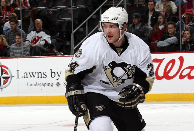 NEWARK, NJ - MARCH 04:  Matt Cooke #24 of the Pittsburgh Penguins skates against the New Jersey Devils at the Prudential Center on March 4, 2011 in Newark, New Jersey. The Devils defeated the Penguins 2-1 in overtime.  (Photo by Bruce Bennett/Getty Images)