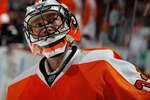 PHILADELPHIA, PA - MARCH 08:  Goalie Brian Boucher #33 of the Philadelphia Flyers looks up at the crowd during warmups before an NHL hockey game against the Edmonton Oilers at the Wells Fargo Center on March 8, 2011 in Philadelphia, Pennsylvania.  (Photo by Paul Bereswill/Getty Images)