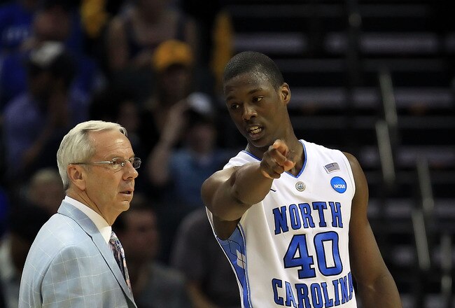 CHARLOTTE, NC - MARCH 20:  Harrison Barnes #40 talks with head coach Roy Williams of the North Carolina Tar Heels while taking on the Washington Huskies during the third round of the 2011 NCAA men's basketball tournament at Time Warner Cable Arena on March 20, 2011 in Charlotte, North Carolina.  (Photo by Streeter Lecka/Getty Images)
