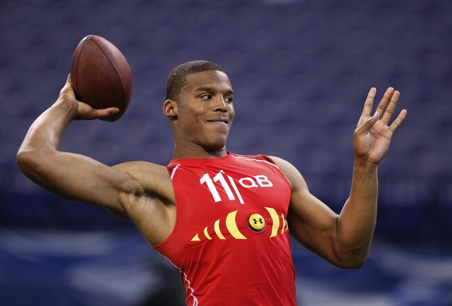 INDIANAPOLIS, IN - FEBRUARY 27: Cam Newton passes the ball during the 2011 NFL Scouting Combine at Lucas Oil Stadium on February 27, 2011 in Indianapolis, Indiana. (Photo by Joe Robbins/Getty Images)