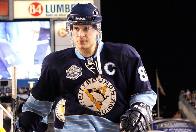 PITTSBURGH, PA - JANUARY 01:  Captain Sidney Crosby #87 of the Pittsburgh Penguins walks out to the ice before playing against the Washington Capitals during the 2011 NHL Bridgestone Winter Classic at Heinz Field on January 1, 2011 in Pittsburgh, Pennsylvania.  (Photo by Jamie Squire/Getty Images)