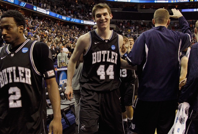 WASHINGTON - MARCH 19:  Andrew Smith #44 of Butler and teammate Shawn Vanzant #2 walk off the court after Butler's victory of Pittsburgh in the third round of the 2011 NCAA men's basketball tournament at Verizon Center on March 19, 2011 in Washington, DC. Butler won the game 71-70.  (Photo by Rob Carr/Getty Images)