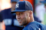SARASOTA, FL - MARCH 07:  Infielder Derek Jeter #2 of the New York Yankees warms up just prior to the start of the Grapefruit League Spring Training Game against the Baltimore Orioles at Ed Smith Stadium on March 7, 2011 in Sarasota, Florida.  (Photo by J. Meric/Getty Images)