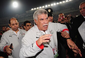 CAIRO, EGYPT - NOVEMBER 14:  Hassan Shehata, the Egypt coach celebrates after the FIFA2010 World Cup qualifying match  between Egypt and Algeria at the Cairo International Stadium on November 14, 2009 in Cairo, Egypt.  (Photo by Clive Mason/Getty Images)