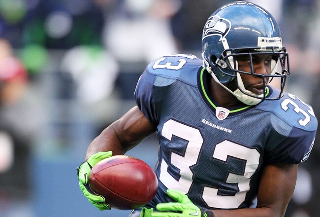 SEATTLE, WA - JANUARY 08:  Leon Washington #33 of the Seattle Seahawks runs down field against the New Orleans Saints during the 2011 NFC wild-card playoff game at Qwest Field on January 8, 2011 in Seattle, Washington.  (Photo by Otto Greule Jr/Getty Images)