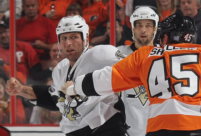 PHILADELPHIA - OCTOBER 16: Michael Rupp #17 of the Pittsburgh Penguins fights with Jody Shelley #45 of the Philadelphia Flyers at the Wells Fargo Center on October 16, 2010 in Philadelphia, Pennsylvania.  The Penguins defeated the Flyers 5-1. (Photo by Bruce Bennett/Getty Images)