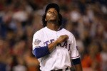 ARLINGTON, TX - OCTOBER 30:  Neftali Feliz #30 of the Texas Rangers reacts after he recorded the final out of their 4-2 win against the San Francisco Giants in Game Three of the 2010 MLB World Series at Rangers Ballpark in Arlington on October 30, 2010 in Arlington, Texas.  (Photo by Ronald Martinez/Getty Images)
